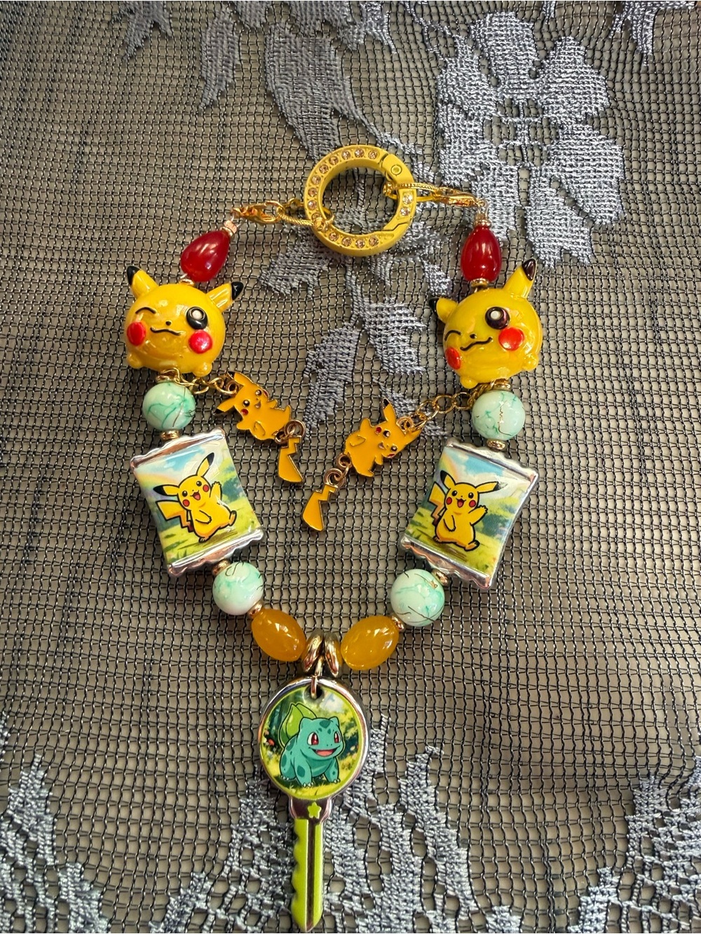 Yellow Pikachu-Themed Keychain with Bulbasaur Key Charm